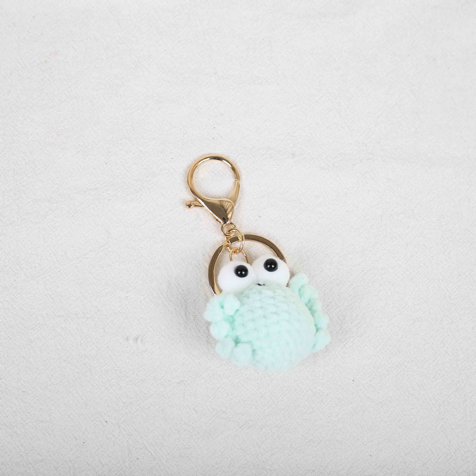 Hebilla oro cangrejo azul claro