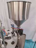 Machine de remplissage et de scellage automatique rotative pour sacs et canettes, ligne d'emballage multi-stations pour liquides/pâtes/gelées/yaourts/sauces, 220V, en acier inoxydable