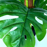 Plante artificielle Monstera en gros, toucher réel, fausse plante tropicale en pot pour la décoration intérieure d'hôtels et de centres commerciaux