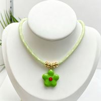 Collier en paracorde tressé avec pendentif fleur en cuivre, perles en cuivre plaqué or, collier ras du cou en corde tressée pour femme, bijoux