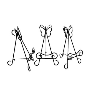 <span class=keywords><strong>Support</strong></span> <span class=keywords><strong>de</strong></span> Présentation en Métal Noir Style Européen en Forme <span class=keywords><strong>de</strong></span> Papillon pour Cadres Photo, Albums et Images – Présentoir Décoratif en Fer Forgé - Product Image 1