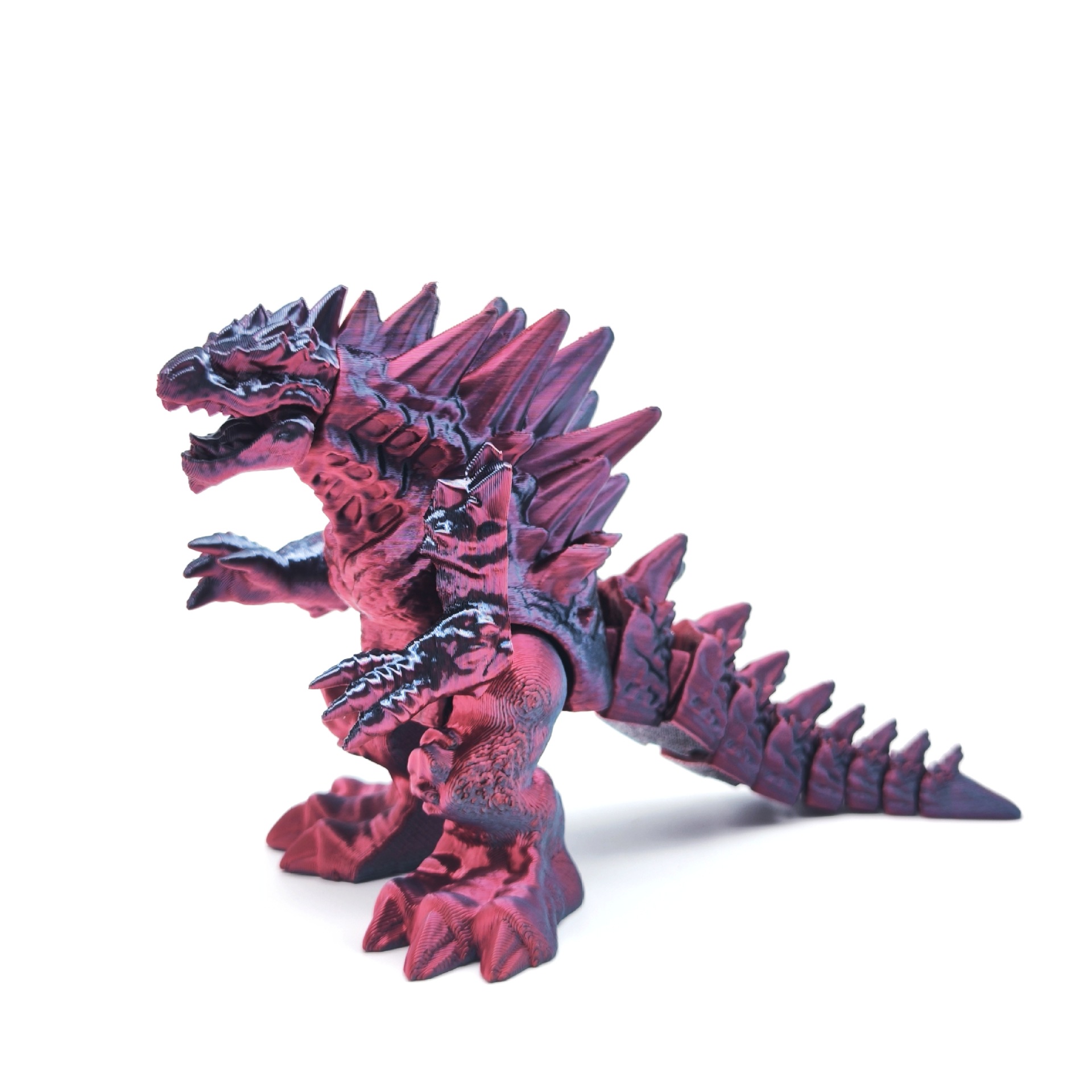 Godzilla rojo-negro-gelo