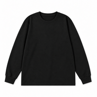 Sweat-shirt homme col rond sans capuche, noir uni, sans fermeture, manches longues, col et poignets côtelés