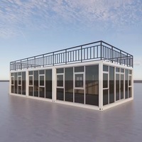 Villa en verre à deux étages, maison conteneur préfabriquée pliable de 20 pieds, toit en pente, véranda, terrasse, isolée, en acier, pour complexe hôtelier, personnalisable OEM ODM