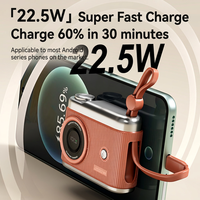 Batterie externe pour appareil photo 10000mAh 22.5W à charge rapide avec câble intégré, design créatif pour une recharge portable
