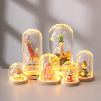 Couvercle en verre de fleur immortelle Base lumineuse avec lampe Boîte aveugle manuelle Micro paysage poupée ornement anti-poussière