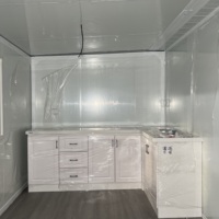 Maison conteneur extensible moderne Huaying de 40 pieds avec cadre noir et jaune désert, étanche et coupe-vent, garantie 5 ans