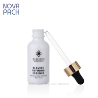 Emballage de soins de la peau vide flacon compte-gouttes cosmétique 30ml 50ml 60ml flacon de sérum en verre blanc opaque en céramique avec compte-gouttes en or