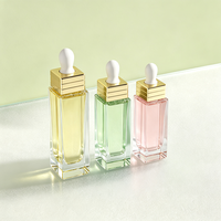 Flacon en verre rectangulaire de luxe 30 ml avec pipette compte-gouttes et anneau doré pour sérum facial, emballage de produits de beauté et de soins de la peau, OEM