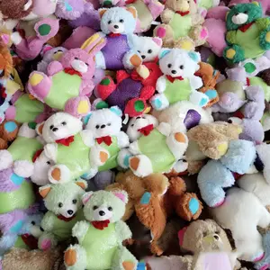 A buon mercato orsacchiotto bambola giocattoli di peluche matrimonio lancio presa macchina bambola mercato merci bambole del fumetto colore misto all'ingrosso