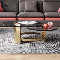 Nouvelle table basse moderne en verre rond avec structure en acier pour salon, vente en gros