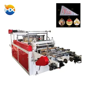 Automatic rolling type dot-cutting triangle cream pastry bag making machine