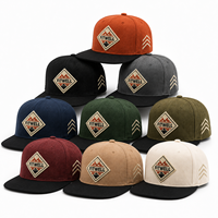 Casquette de baseball à six panneaux texturée avec logo personnalisé et patch brodé pour les marques de streetwear OEM ODM