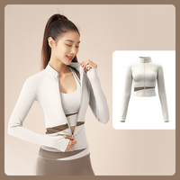 Manteau de yoga de sport de conception libre veste de survêtement de yoga à manches longues et fermeture éclair pour femme de grande taille