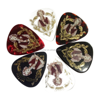 Fabricant de plectres de guitare : Vente de plectres de guitare personnalisés avec logo, formes variées, matériaux variés, conception sur mesure par l'acheteur, différents procédés d'impression, en feuille.