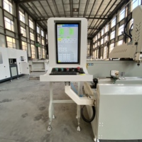 Machine de perçage et de fraisage CNC OUWO avec table rotative de 1800 mm, fonction d'usinage sur trois côtés pour profilés en aluminium et en PVC