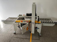 Machine de scellage de bande de boîte de carton aléatoire entièrement automatique de dimension non uniforme à vendre