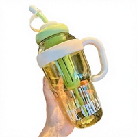 Bouteille d'eau à paille grande capacité avec poignée et compartiment à glaçons, en plastique portable pour usage extérieur
