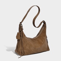 Sac à main de haute qualité 2026 Style rétro Sac à bandoulière de créateur Pompons Sangle réglable Élégant Sac hobo en cuir vegan pour femmes