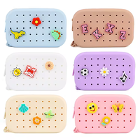 Petit porte-monnaie ovale en silicone à la mode nouveau sac cosmétique décoratif bricolage avec fermeture à glissière et trou décoratif