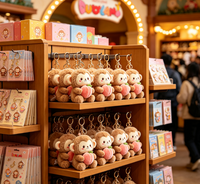 Porte-clés en peluche singe marron assis avec pêche, jouet animal en peluche, poupée singe avec breloque fruit rose
