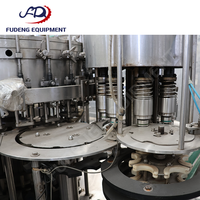 Machine de remplissage automatique polyvalente pour différentes tailles de bouteilles, remplisseuse linéaire par gravité avec réglage facile du volume