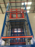 Plateforme élévatrice de fret hydraulique à chaîne pour entrepôt, avec rail de guidage vertical et moteur mural, pour la construction