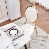 Chaises de banquet d'extérieur modernes en métal empilables, de luxe, dorées, de haute qualité, écologiques et étanches, pour villas et hôtels – Vente chaude
