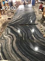 Marbre noir naturel de la Forêt-Noire, base noire profonde avec des veines ondulées superposées, poli moderne pour les sols de villas de luxe, salons et salles à manger