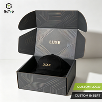 Boîte d'expédition rigide élégante en carton ondulé noir mat certifié avec estampage holographique et fermeture à oreilles, pour chapeaux