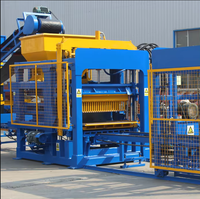 Machine à briques en béton automatique multifonctionnelle QT5-15 avec moules personnalisés pour la fabrication de pavés et de bordures de routes