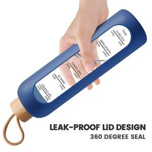 Haute qualité de qualité alimentaire 32 ozGrande capacité bouteille d'eau en verre borosilicaté Gym Yoga bouteille en verre avec couvercle en bambou manchon en Silicone - Product Image 4