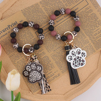 Cadeau pour la fête des mères, porte-clés en silicone à motif léopard avec pompon, breloques mignonnes en forme de patte de chien, bracelet porte-clés, porte-clés de voiture