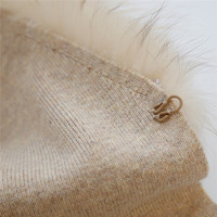 Gilet en laine tricotée bleu marine sans manches avec col en fourrure de raton laveur, nouveau design printemps-automne, vente en gros Tyan, gilet en pure laine personnalisé pour femme