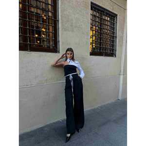 ชุดเสื้อเชิ้ตสีดำสำหรับผู้หญิง ทรงเข้ารูป คอปกสีขาว แขนยาว พร้อมกางเกงขายาวทรงกว้าง ชุดแฟชั่น - Product Image 2