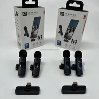 Produk laris mikrofon Lavalier 2.4GHz 1Drag 2 K9 mikrofon portabel klip nirkabel Lavalier Live konferensi untuk ponsel iphone dan Android