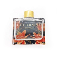 Bouteille de diffuseur d'arôme en verre enduit par pulvérisation solide de 120ml bouchon en caoutchouc de couleur personnalisable bouteille en verre de diffuseur d'huile essentielle vide