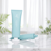 Tubo de PE Azul Mate Claro, Tubo Flexible con Impresión de Logotipo Chino Personalizado, con Tapa Plana Ovalada Blanca para Crema de Manos Perfumada
