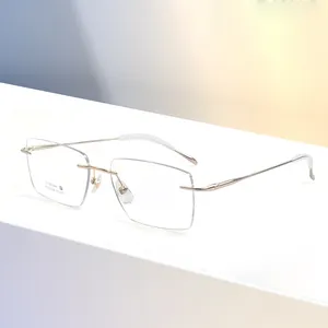 Lunettes à monture optique en titane sans monture Rectangle personnalisé de haute qualité Lunettes de vue pour hommes et femmes d'affaires