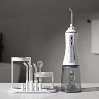 Irrigateur buccal électrique, nettoyeur de dents portable, dispositif d'hygiène buccale