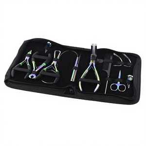 Kit d'outils d'extension de cheveux professionnels avec étui Extensions de brosse à boucle Pince d'enlèvement de perles Séparation du doigt Peigne Ruban dans la pince - Product Image 1