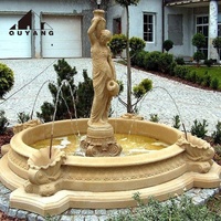 Grande fontaine en marbre beige de style européen, sculptée à la main, avec statue de femme classique, pour la décoration de villa et de jardin