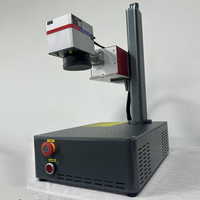 Machine de marquage laser UV de bureau refroidie à l'eau 3W 5W pour le marquage du plastique, du verre et du métal