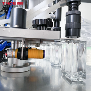 Buscar Productos de alta calidad, 4 cabezales, semiautomático, Perfume, Cosméticos, llenado de fragancias, máquina neumática de Llenado de líquidos al vacío - Product Image 4