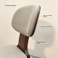 Chaise de salle à manger simple et moderne de style nordique en bois massif, avec rembourrage en coton et lin épais, design sans accoudoirs pour une utilisation polyvalente dans les salles à manger