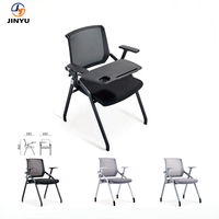 Chaise de conférence ergonomique pliable en maille noire avec tablette pliable, empilable et confortable pour usage au bureau