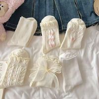 Chaussettes mi-mollet en dentelle blanche pour femme, respirantes, tricotées avec compression, pour usage quotidien au printemps, logo sur le bord et le corps