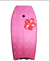 Planche de surf rose pour la plage, adaptée aux débutants