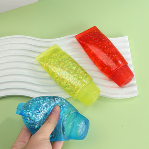 Ornement anti-stress à presser en tube scintillant, décoration étoile à paillettes pour soulager le stress - Product Image 1