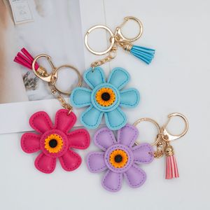 Le sac populaire, un accessoire best-seller sur Instagram, <span class=keywords><strong>porte</strong></span>-clés en cuir et <span class=keywords><strong>porte</strong></span>-clés créatif en émail tournesol, un cadeau original. - Product Image 4